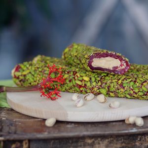 POMEGRANATE flavored Turkish delight with hazelnut cream filling, and sprinkled with pistachios (200 G)